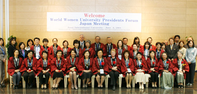 Commemorative Photograph of Meeting Attendees Wearing Happi Coats with the Josai University Insignia