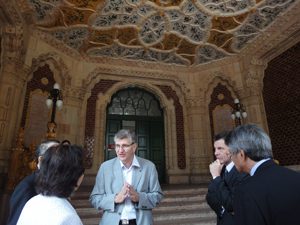 Curator Tacaks Stands at the Entrance to the Museum of Fine Arts with its Excuisite Zsolnay Ceiling