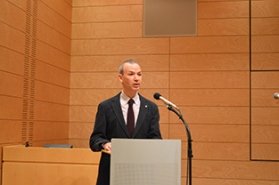 Professor Akira Mizuta Lippit provides opening remarks