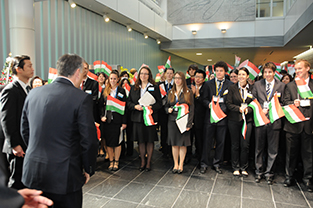 Waving the Hungarian flag in welcome