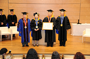 Mr. Yonekura with his honorary doctorate (second from the right)
