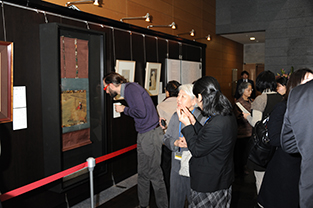 Attendees admire the ukiyo-e exhibit on special display