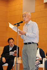 Mr. Takeuchi during his reading