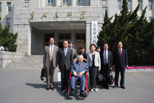 Posing in front of the Dalian Government Office