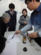 Observing a demonstration of fingerprint collection