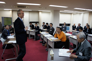 Mr. Brummer gives his lecture