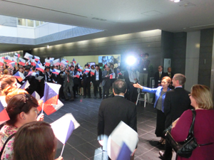 Flag waving students greet the Czech visitors