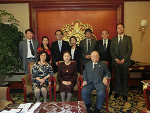 A commemorative photo with representatives from both parties