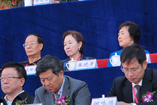 Chancellor Mizuta seated alongside other special invitees