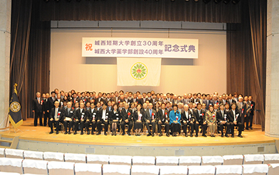 A commemorative photo with ceremony participants