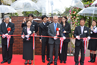 Ribbon cutting at the rose garden entrance