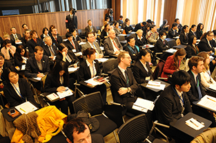 Participants listen eagerly to the presentation