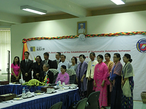 Post-signing commemorative photo with participants