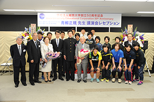 Surrounded by students during the reception