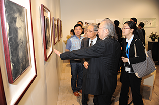 Mr. Zhang explaining the artwork