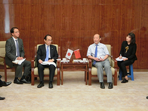 Meeting with President Bi Kaishun